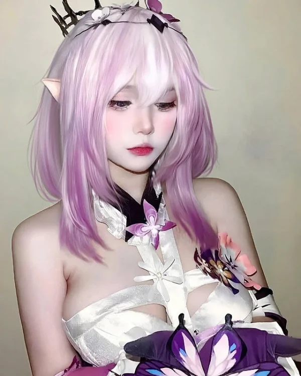 越南coser惊艳演绎王者荣耀·齐:紫色丸子头造型引爆社交网络